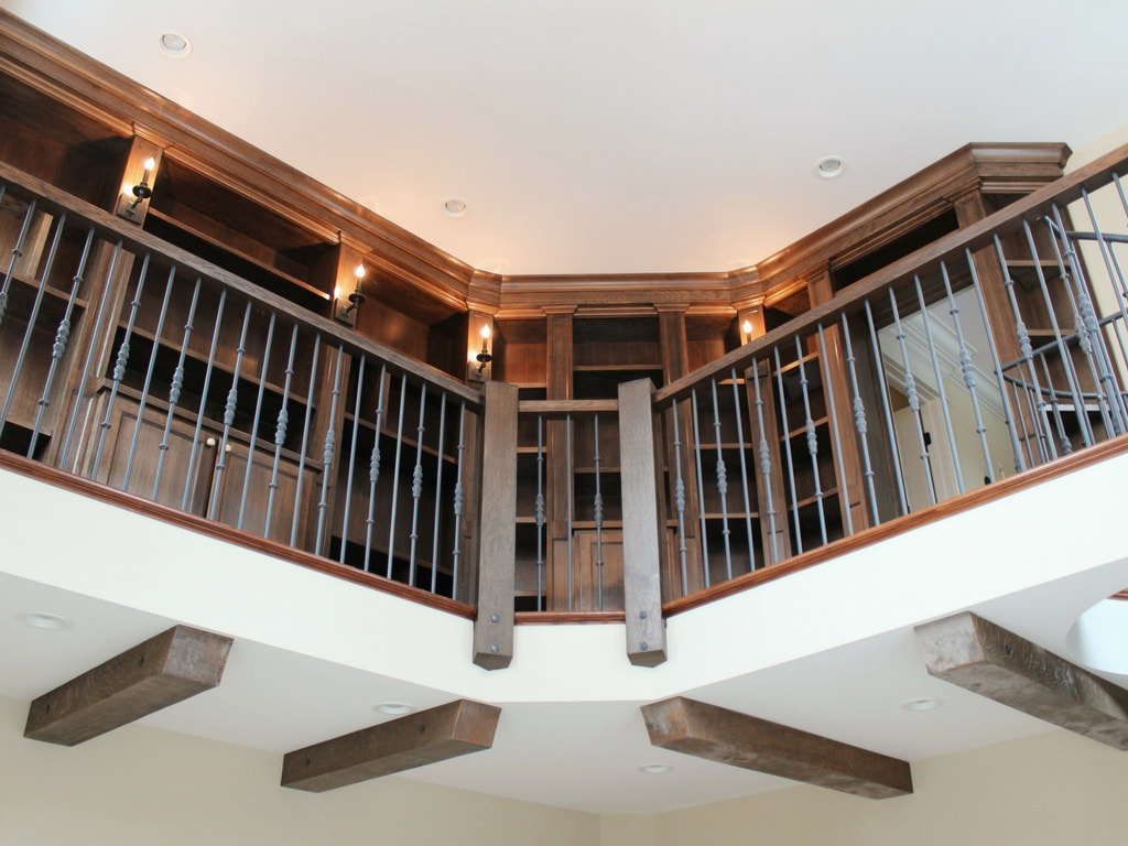 Custom Office with Floor-To-Ceiling, Second Floor Bookcase, Spiral Staircase, Large Windows, and Vintage Pendant Built Exclusively by Morgan Homes of Western New York, Inc.